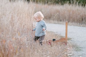 Child playing in field